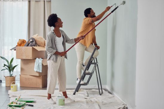 Couple Painting their home